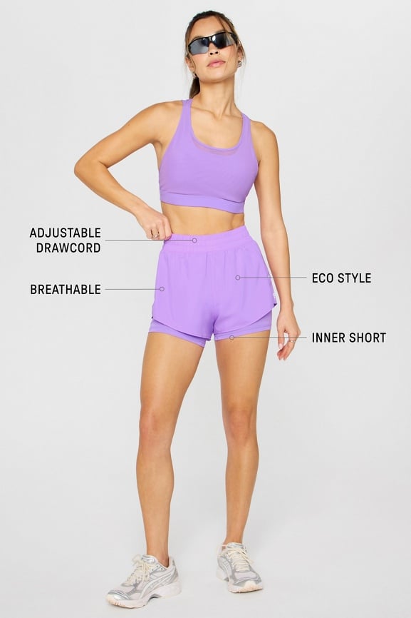 Short de running reflectante 5 cm 2 en 1