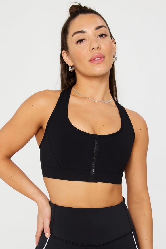 Tempo Windbreaker + Essential Front Zip Medium Impact Bra + Oasis HW Kick Flare 3-Piece Bundle