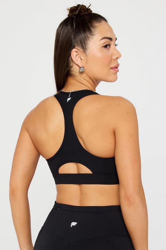 Tempo Windbreaker + Essential Front Zip Medium Impact Bra + Oasis HW Kick Flare 3-Piece Bundle
