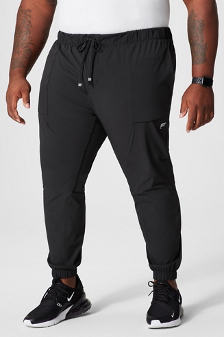  Fabletics Men's The One Jogger, Quick-Dry, Hidden Pockets, Zip  Pockets, UPF Protection, Anti-Stink, Lightweight, XS/Regular 29 in