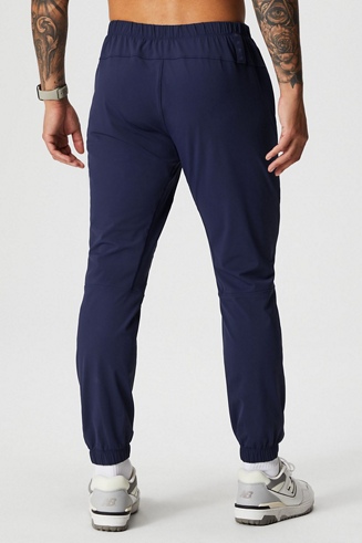 Fabletics Men's The One Jogger, Quick-Dry, Hidden Pockets, Zip Pockets, UPF  Protection, Anti-Stink, Lightweight