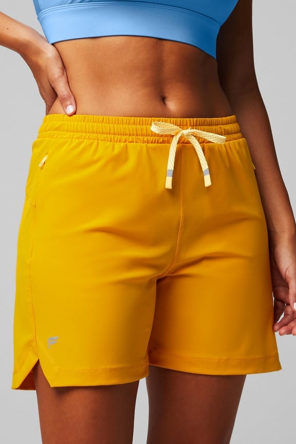 Fabletics Shorts Womens Medium M Austyn Run Short Orange Back Zip Pocket New